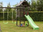 Bild von Plus Play Spielturm mit Dach, Schaukelbalken und grüner Rutsche 460 x 395 x 283 cm